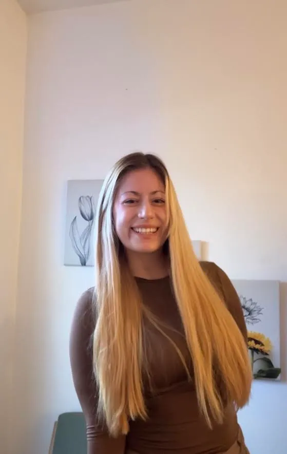 Joanna Tsotas smiling
